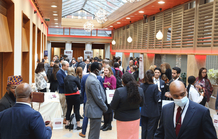 Diplomats unwind after a busy day with a networking reception