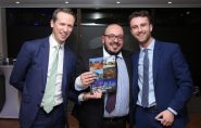 The hard-working CCL Executive Secretary Minos Papanikolaou (Cyprus) wins a well-deserved prize from Edward Dick (left) and Charles Brook (right) of BMW Diplomatic Sales